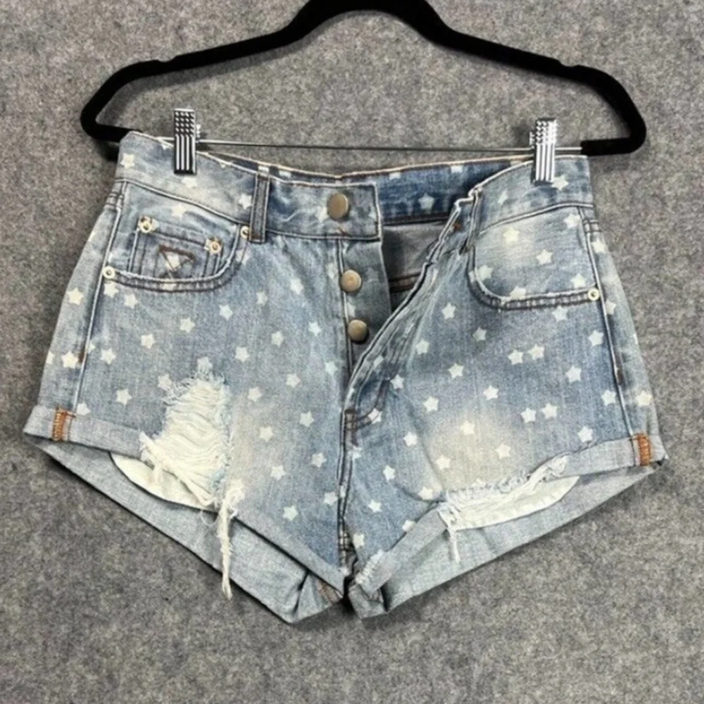 Superdown Revolve Kenzie Star Denim Shorts in Light Blue Wash​​​​​​​​​​​​